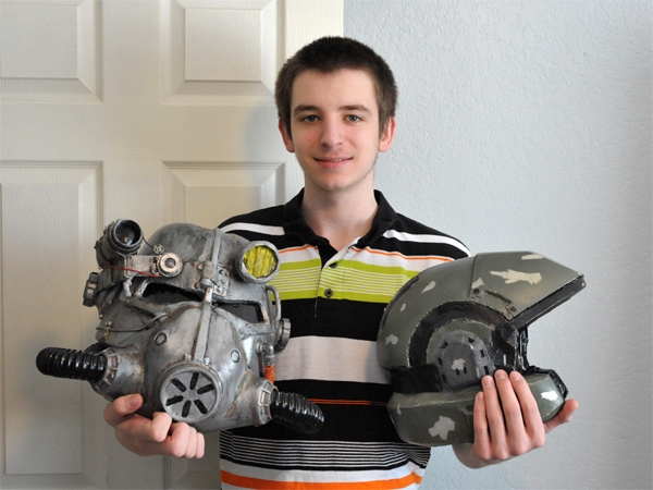 Davis shows off his hand-made Fallout 3 and Halo Master Chief helmets